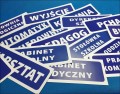 Przykładowe tabliczki na drzwi